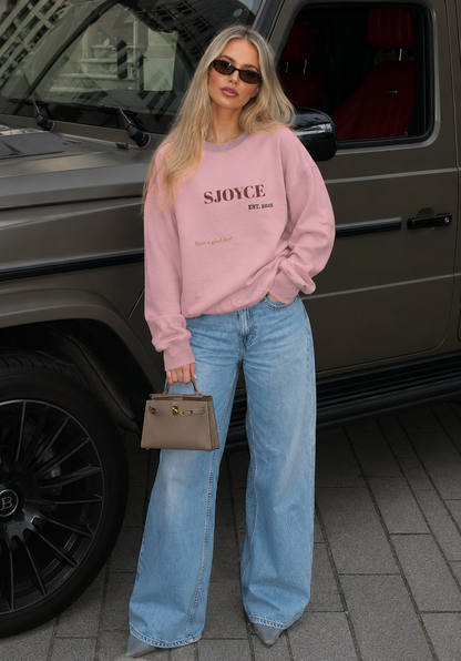 SJOYCE sweatshirt with a relaxed fit, featuring a soft fabric texture and a casual crewneck design in a stylish color.