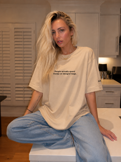 SJOYCE T-Shirt - People actually spend  money on designer bags.